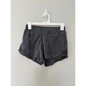 Lululemon hotty hot low rise lined 4 inch shorts size 4 
Diamond dye pitch grey